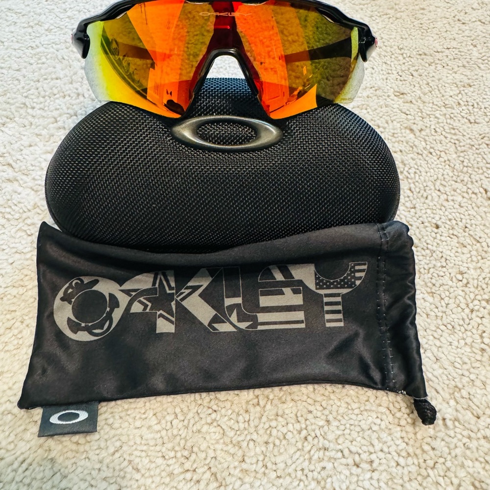 Oakley Sunglasses with Orange Lenses and Black Case